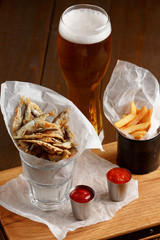 Sprat and french fries with gravy