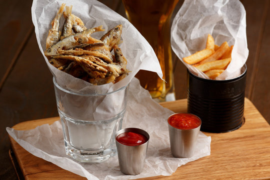 Sprat and french fries with gravy
