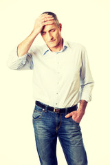 Fototapeta premium Mature man with huge headache