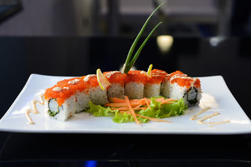 Japanese sushi on a white plate.