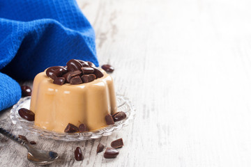 Coffee panna cotta with chocolate candies