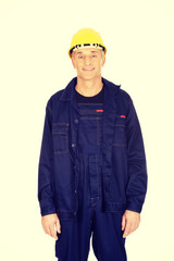 Mature worker with hard hat