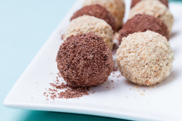 Homemade candies with chocolate and almonds powder