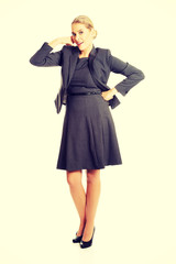 Woman making phone gesture