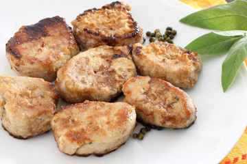Roasted pork fillet in white plate