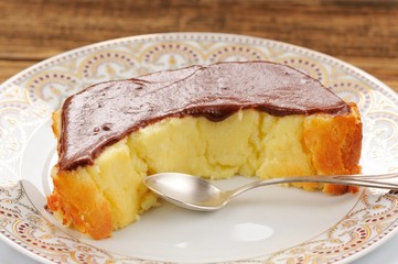 Homemade oldfashioned pie with chololate icing and tea spoon on