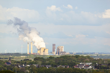 Distant Power Station in Rural Landscape