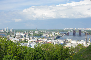 Fototapeta na wymiar A view on bridge over the river Dniper. Kyiv, Ukraine