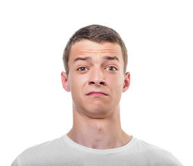 Obraz premium Zdziwiony młody człowiek.