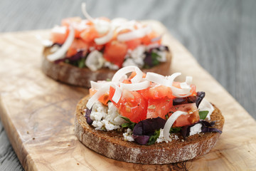 homemade bruschetta with ricotta tomatoes and herbs