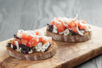 homemade bruschetta with ricotta tomatoes and herbs