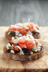 homemade bruschetta with ricotta tomatoes and herbs