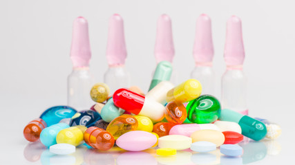 ampoule and pills shot