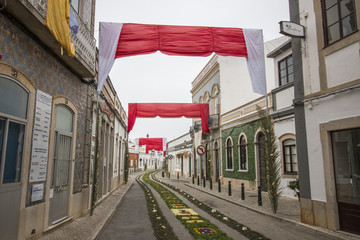 SAO BRAS DE ALPORTEL, PORTUGAL - April, 2015: Traditional religious procession of the flower torches event located in village of Sao Bras de Alportel, Portugal. © Mauro Rodrigues