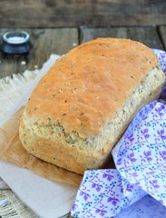 Homemade bread with oat flakes, linseed and black sesame seeds