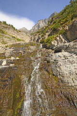 Mountain Stream Rushing Down the Slope