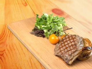 Steak, mustard, salad.