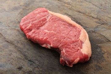 raw aged sirloin steak