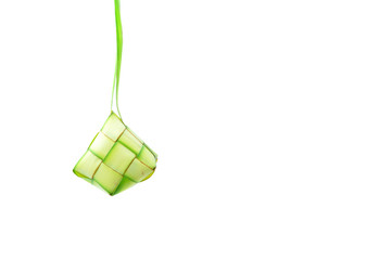 Ketupat or rice dumpling is a local delicacy during the festive season..Ketupat, a natural rice casing made from young coconut leaves for cooking rice on a white background