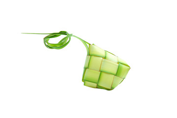 A diamond shaped traditional packed rice made from woven leaf. Ketupats, a natural rice casing made from coconut leaves for cooking rice on white background