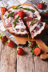 rustic strawberry sweet cake on a cutting board
