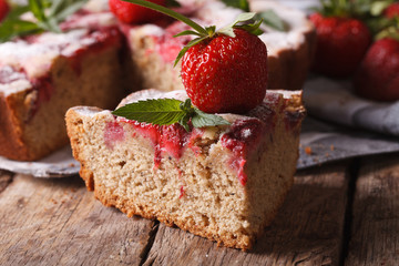piece of strawberry pie on a table close-up. Horizontal rustic
