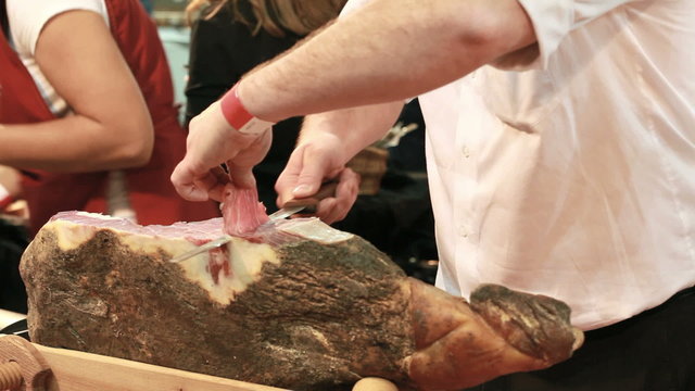 Cutting the Croatian Dry Ham