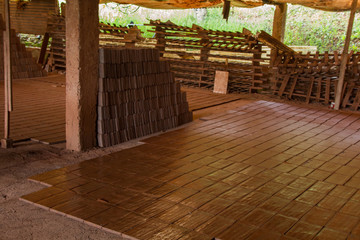 View of a bed of traditional mud brick production factory.