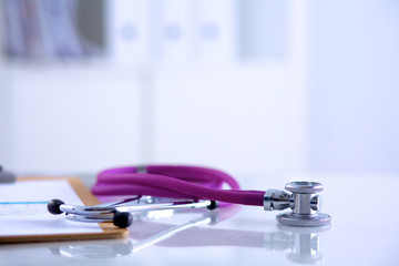 Doctor&amp;amp;amp;#39;s stethoscope  with folder on the