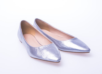 shoe. Silver colour fashion woman shoes on a background.
