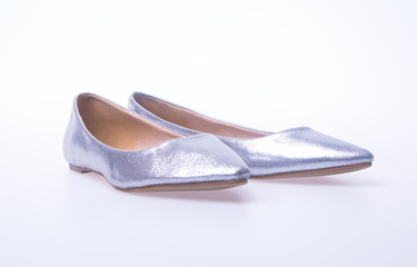shoe. Silver colour fashion woman shoes on a background.