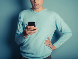 Young man using smart phone