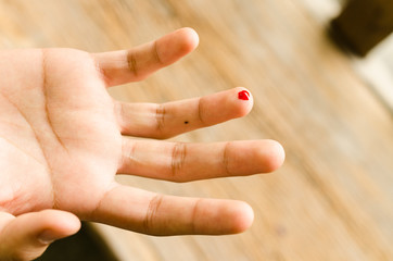 drop of red blood from finger for test glucose