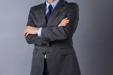 Businessman standing with arms crossed