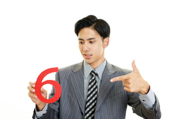 数字を持つビジネスマン