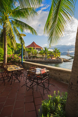 Cafe with tables on a background of the sea