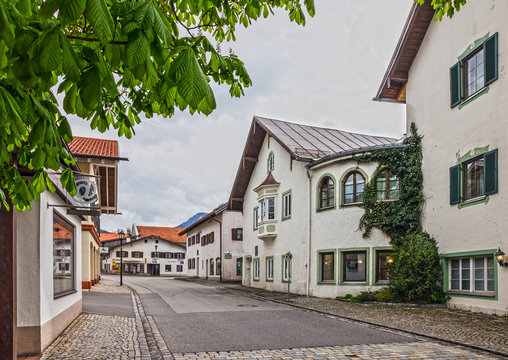 Painting houses in village Oberammergau, Bavaria, Germany
