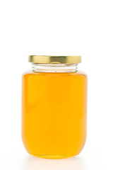 Honey jar isolated on white background