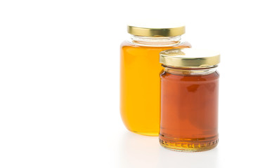Honey jar isolated on white background