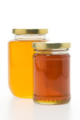 Honey jar isolated on white background
