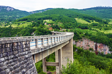 Fototapeta na wymiar Mountain landscape, Montenegro. Durdevica Tara arc bridge