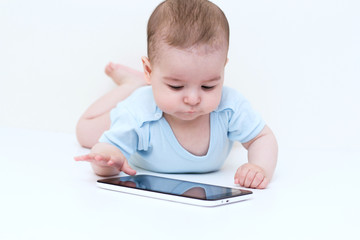 Beautiful baby with tablet