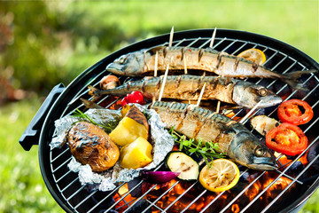 Grilled mackerel fish with baked potatoes