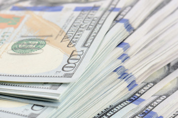 close up hundred dollars bank notes background