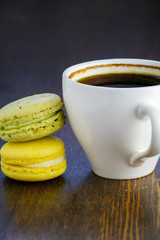  lemon macaroon and a cup of coffee