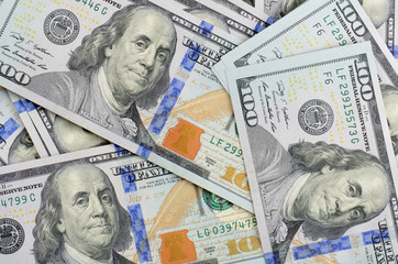 close up hundred dollars bank notes background