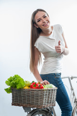 Beautiful healthy woman with vegetables and fruits