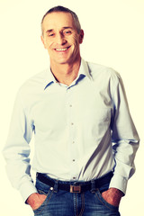 Fototapeta premium Handsome man with hands in pockets