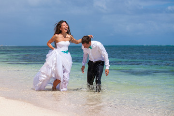 Beach couple walking on romantic travel.