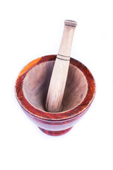 wooden mortar and pestle isolated on white background